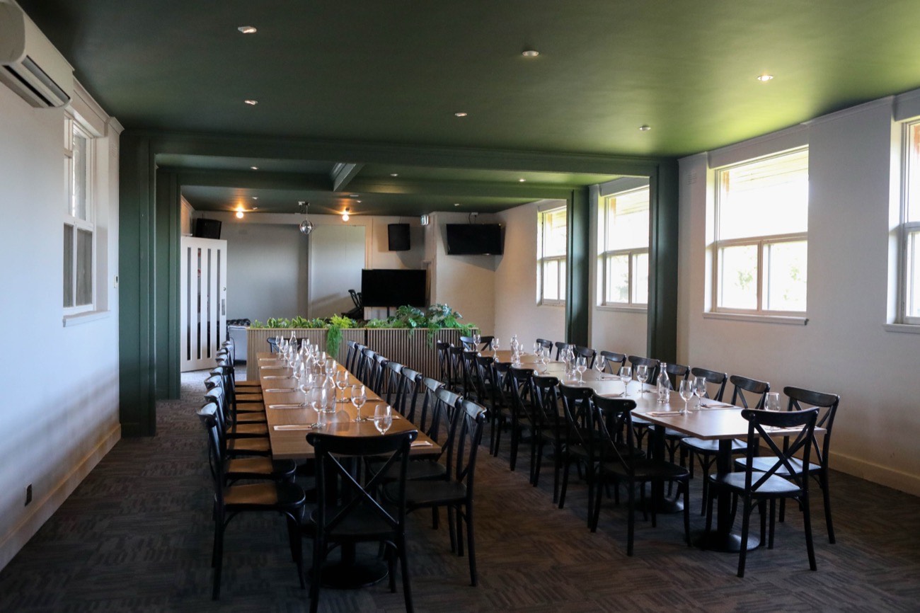 The function room set with a long timber table