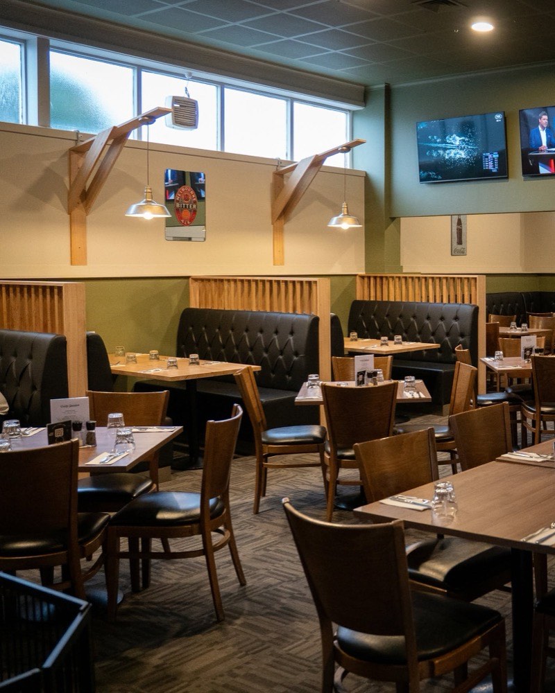 Booth seating and tables in the bistro
