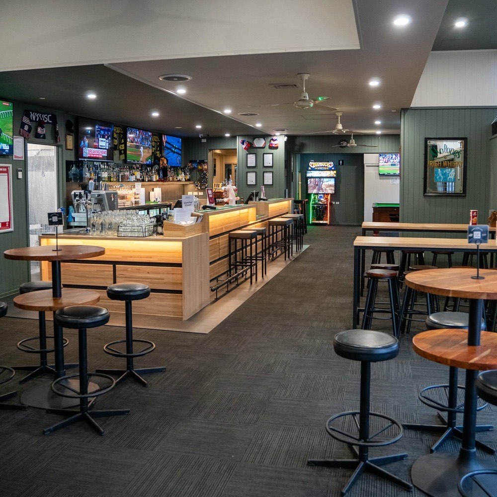 The public bar with stools and high tables