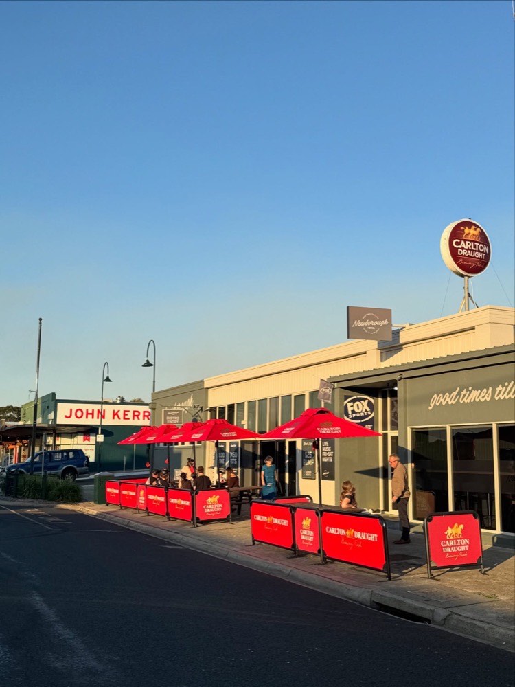 Tables on the footpath out the front of the hotel